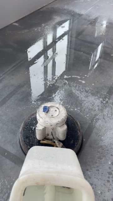 Floor cleaning showing reflection